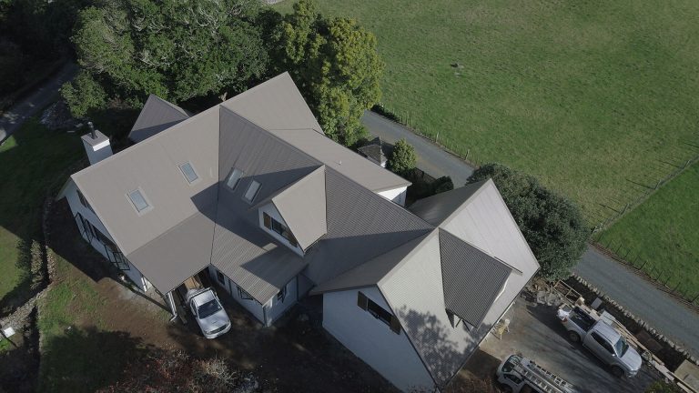 Reliance Roofing - image of a house roof